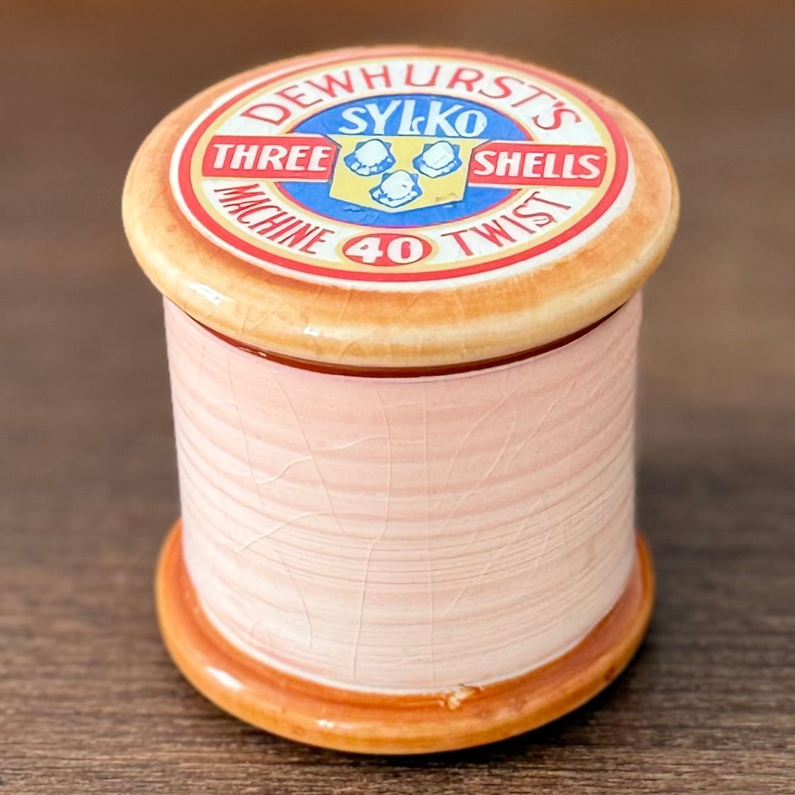 Dewhurst Sylko Three Shells Ceramic Cotton Reel Pot Pink