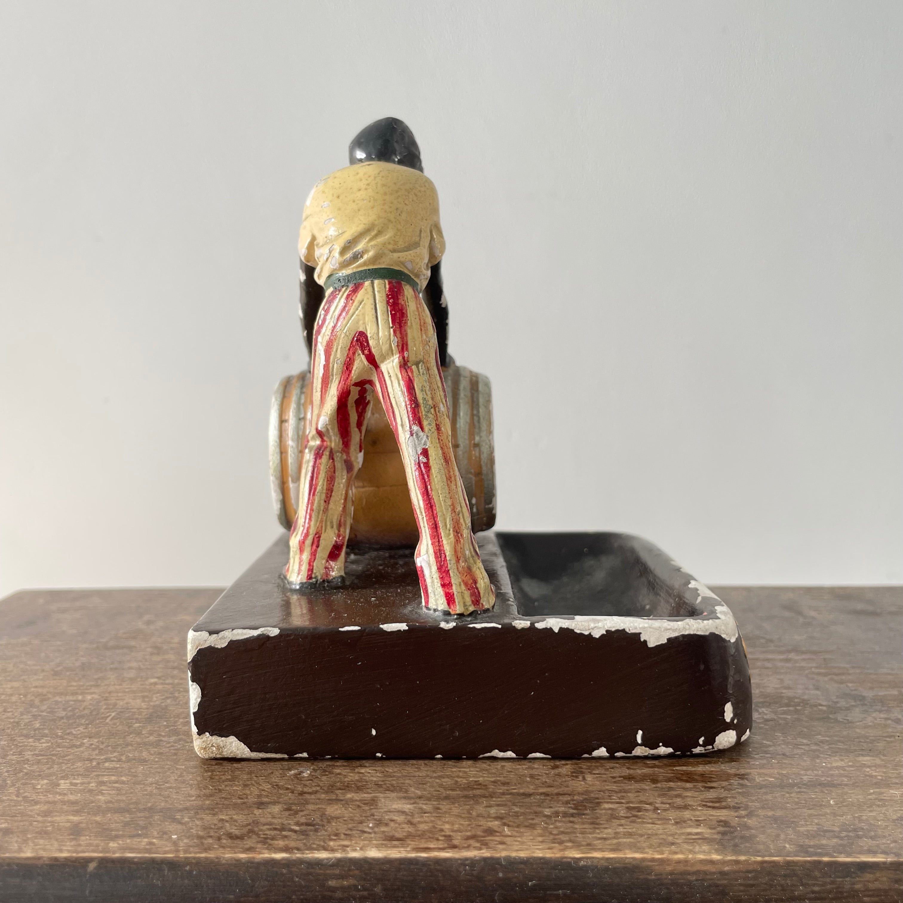 Antique “The Golden Spirit” Lemon Hart Rum Advertising Ceramic Figure Ashtray c.1920s–30s (Repaired)