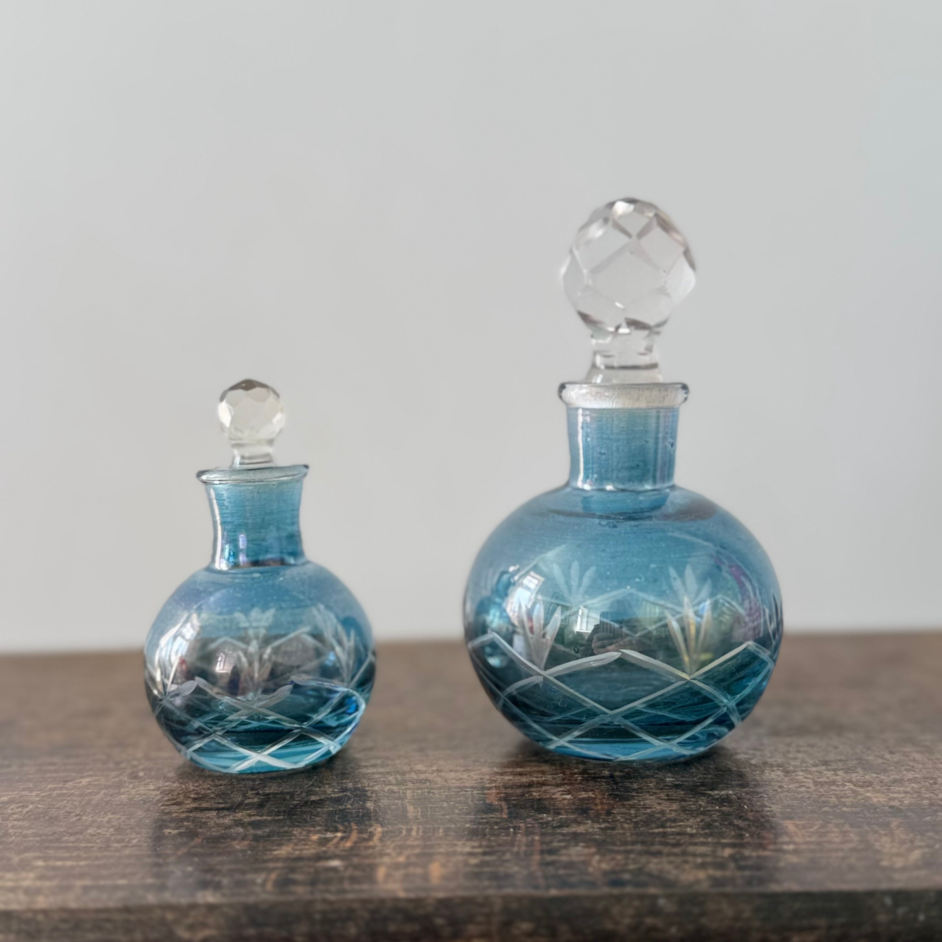 Two perfume bottles