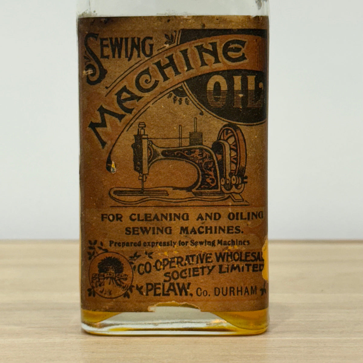 Edwardian Sewing Machine Oil Bottle, Cooperative Wholesale Society, Pelaw