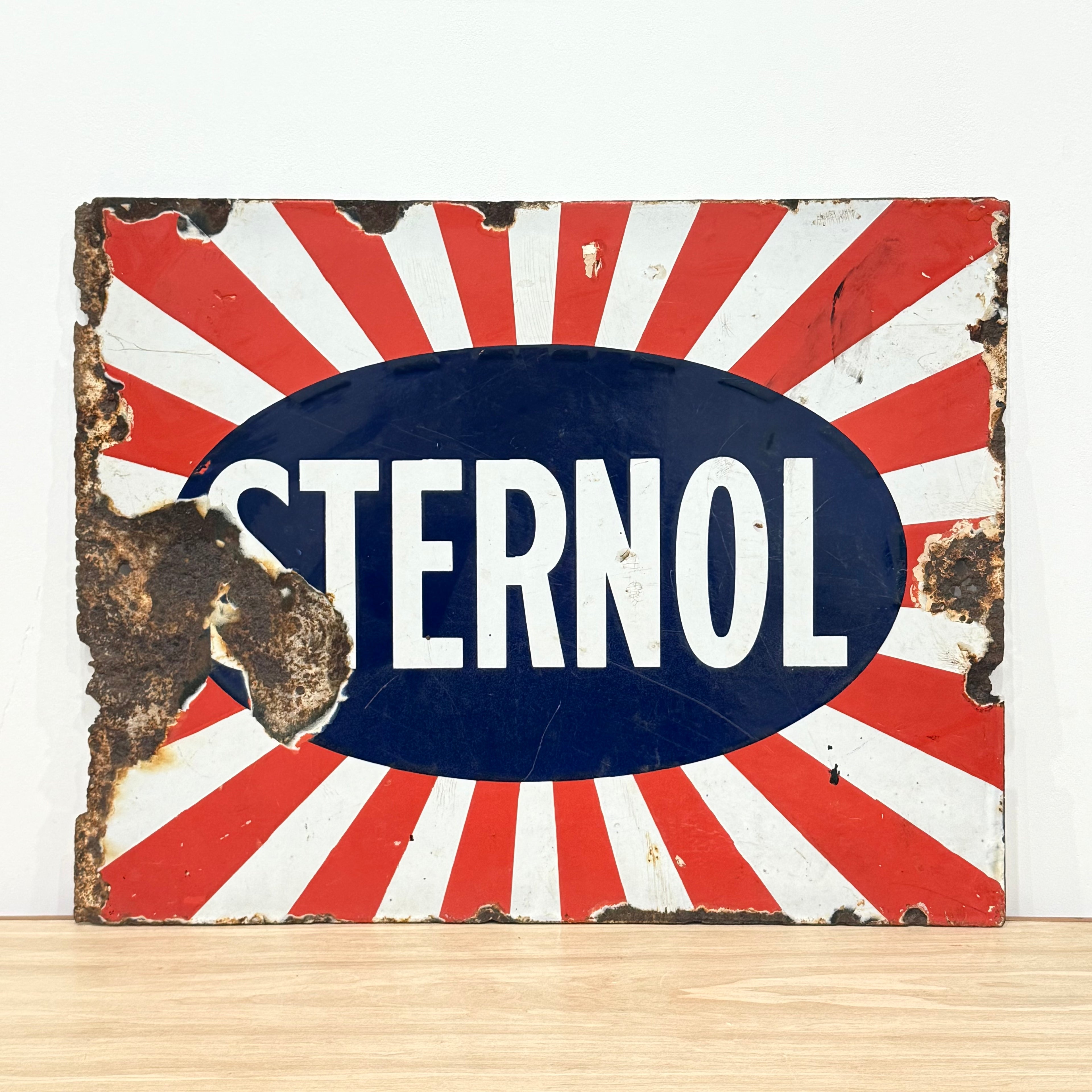 Original Sternol sunburst enamel advertising sign