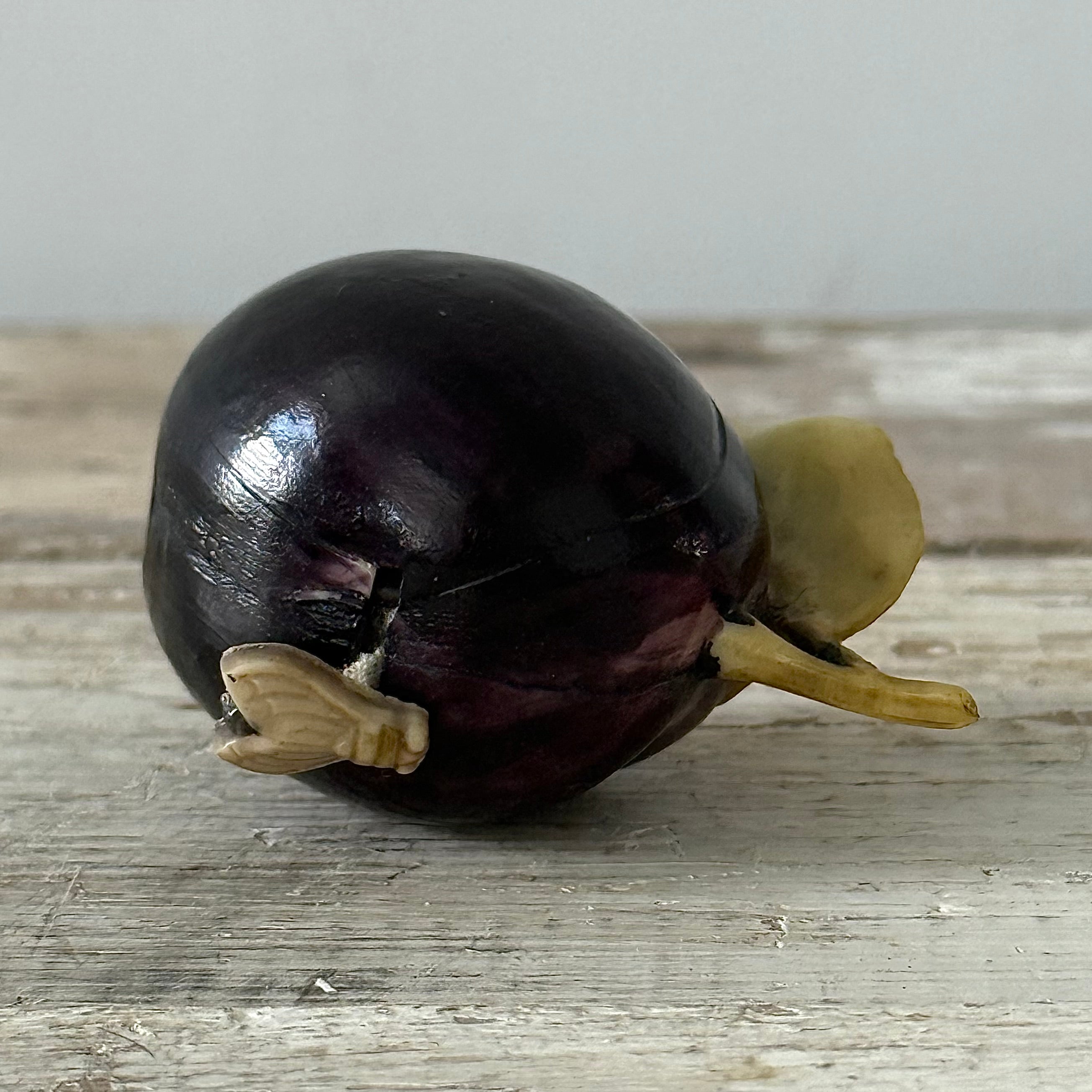 Antique Celluloid Plum Tape Measure with Fly Pull