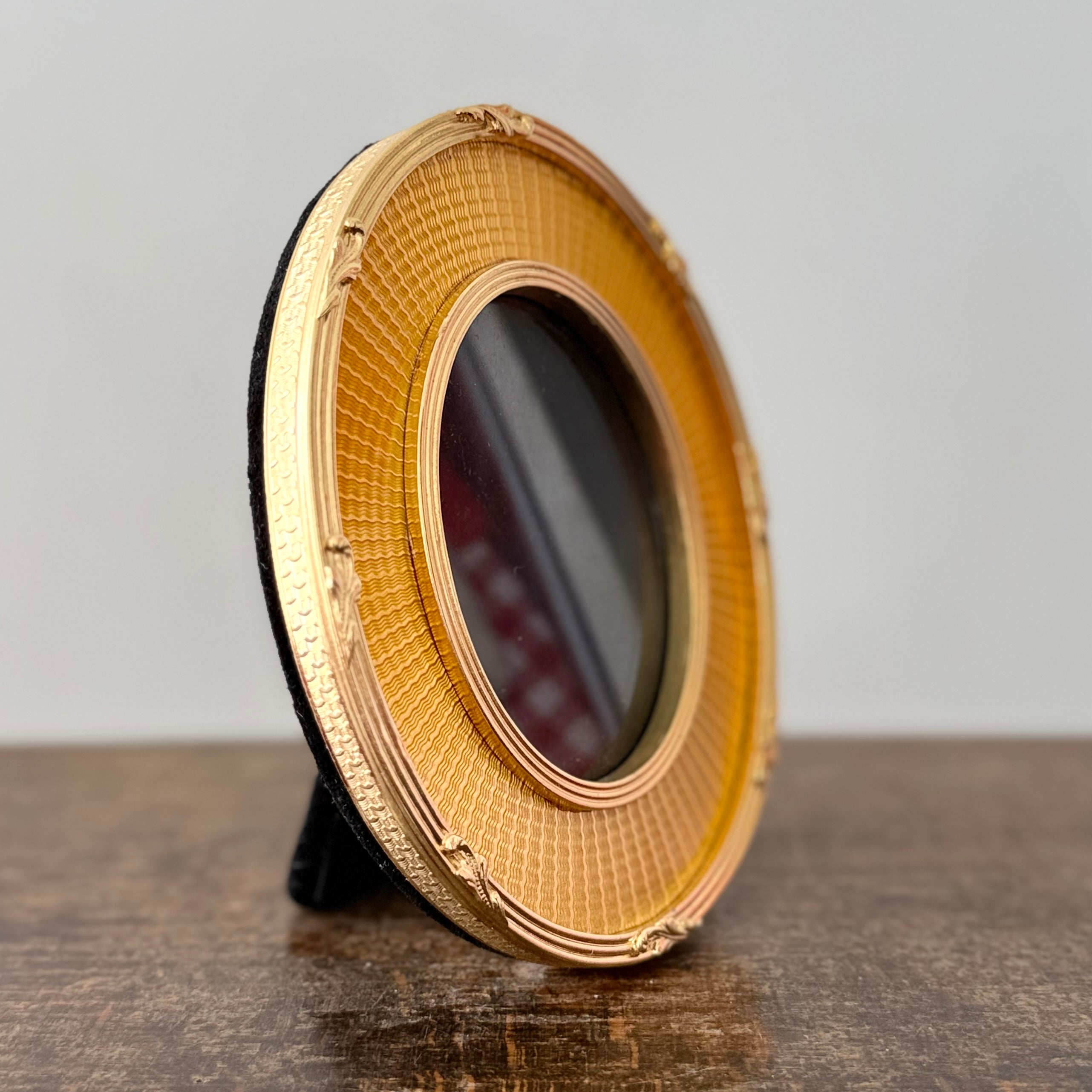 Gold oval frame