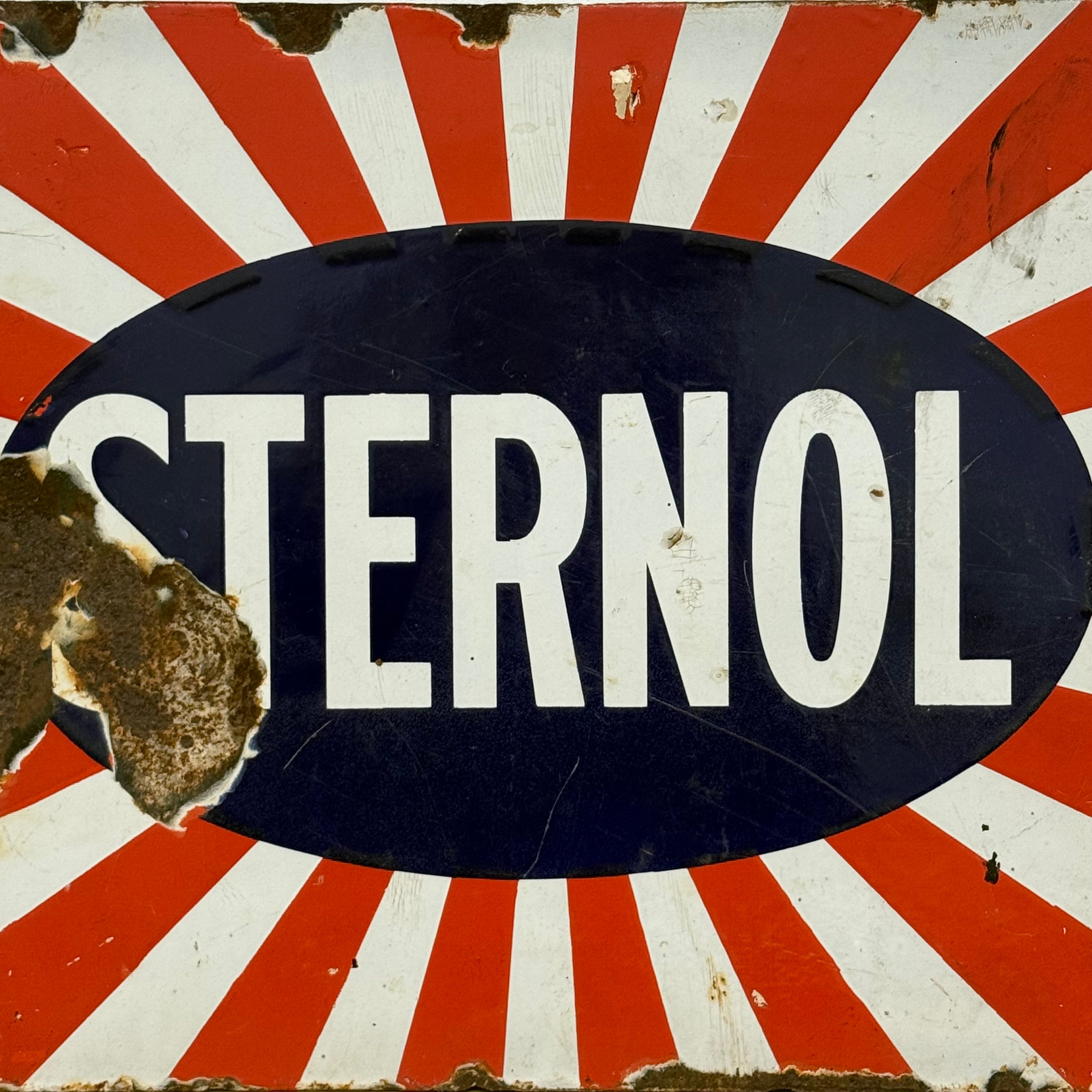 Original Sternol sunburst enamel advertising sign