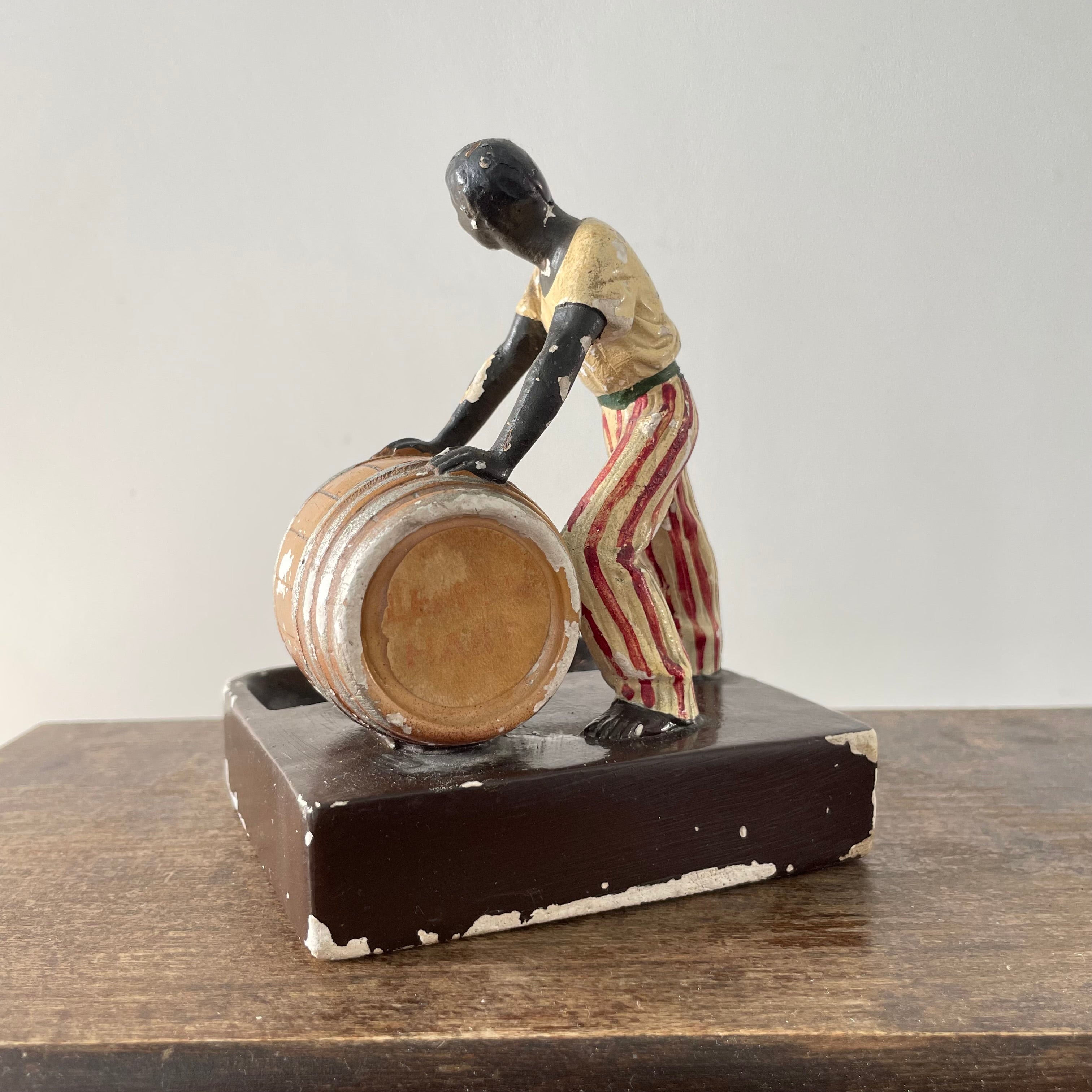 Antique “The Golden Spirit” Lemon Hart Rum Advertising Ceramic Figure Ashtray c.1920s–30s (Repaired)
