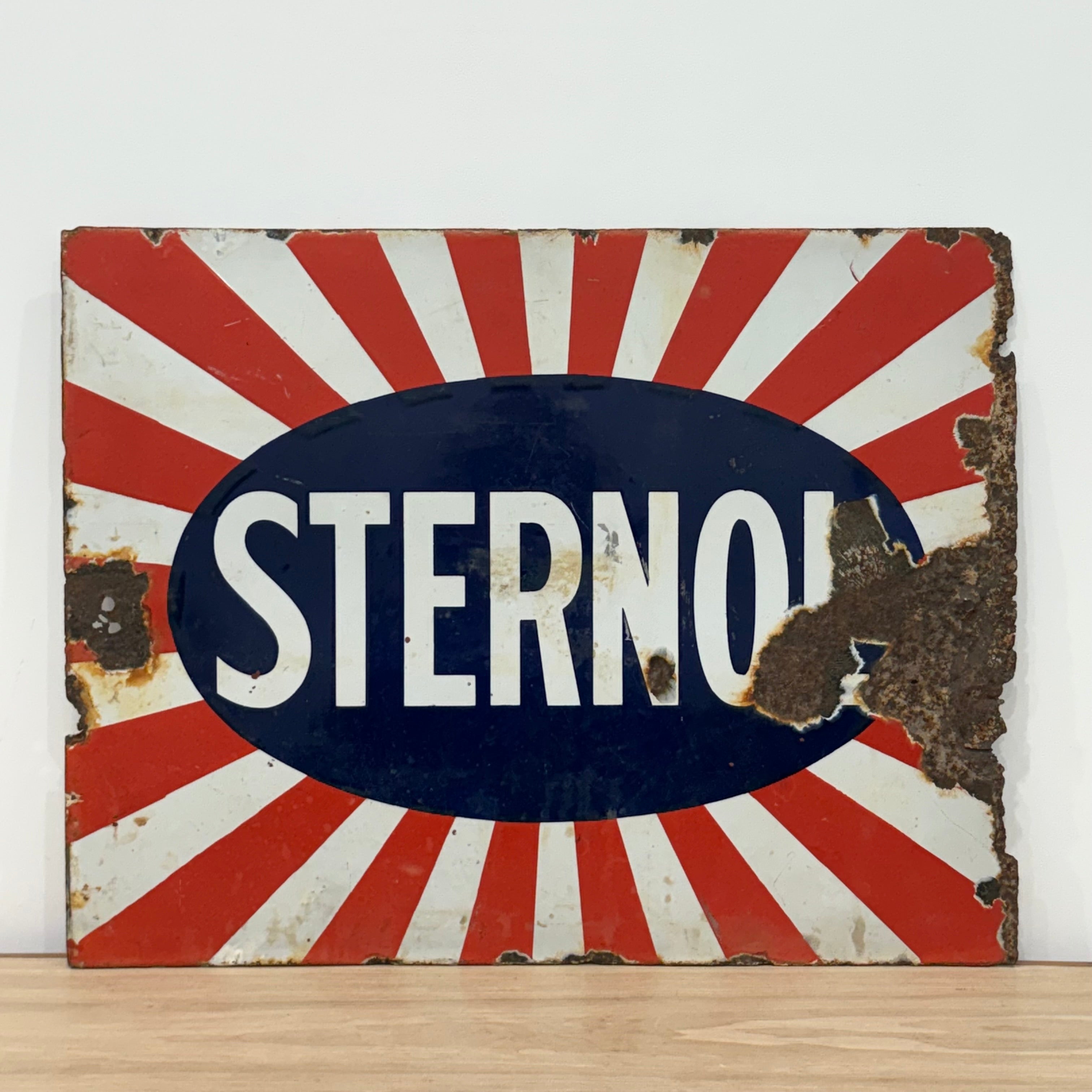 Original Sternol sunburst enamel advertising sign