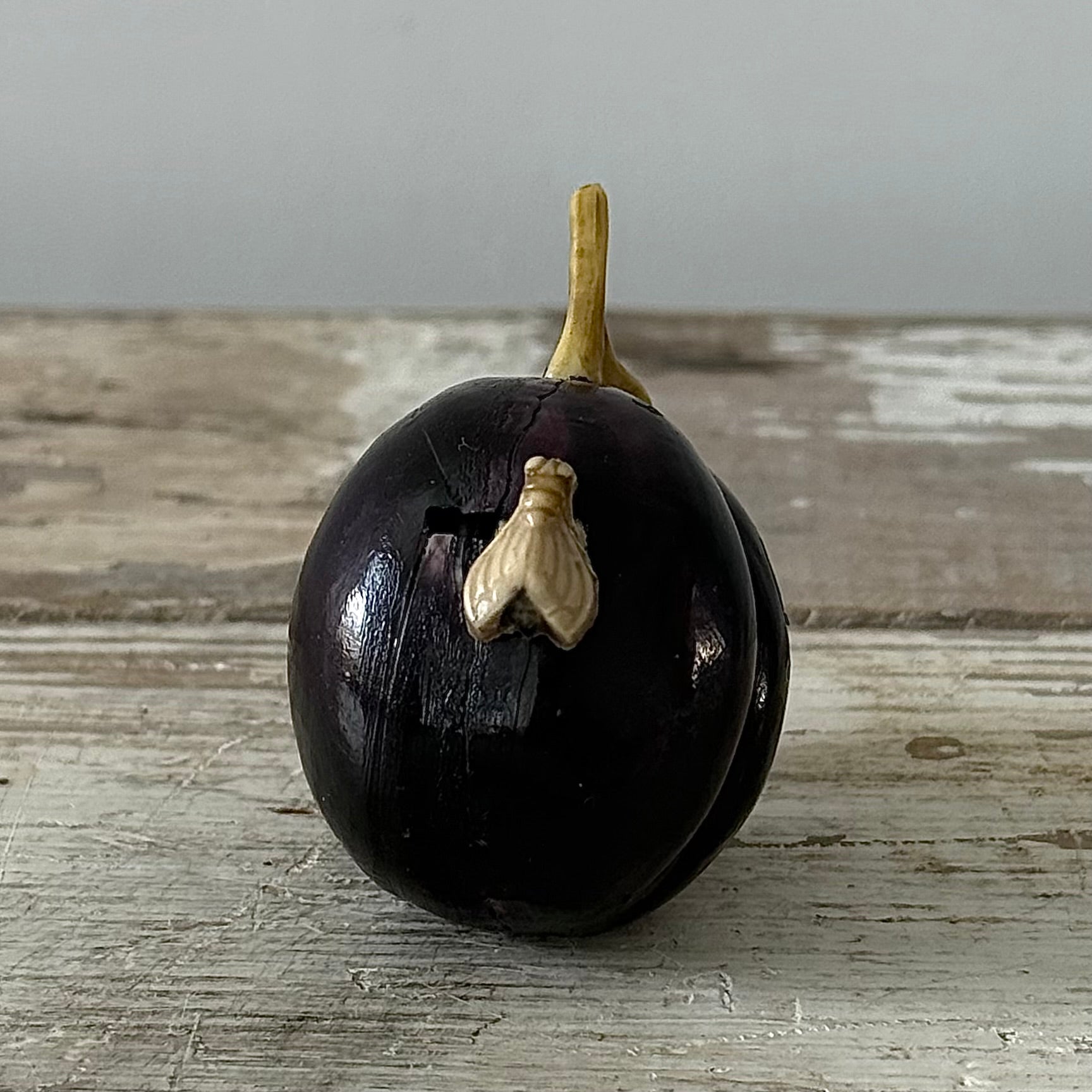Antique Celluloid Plum Tape Measure with Fly Pull