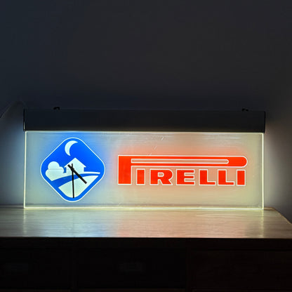 Illuminated Pirelli garage advertising lightbox sign with clock