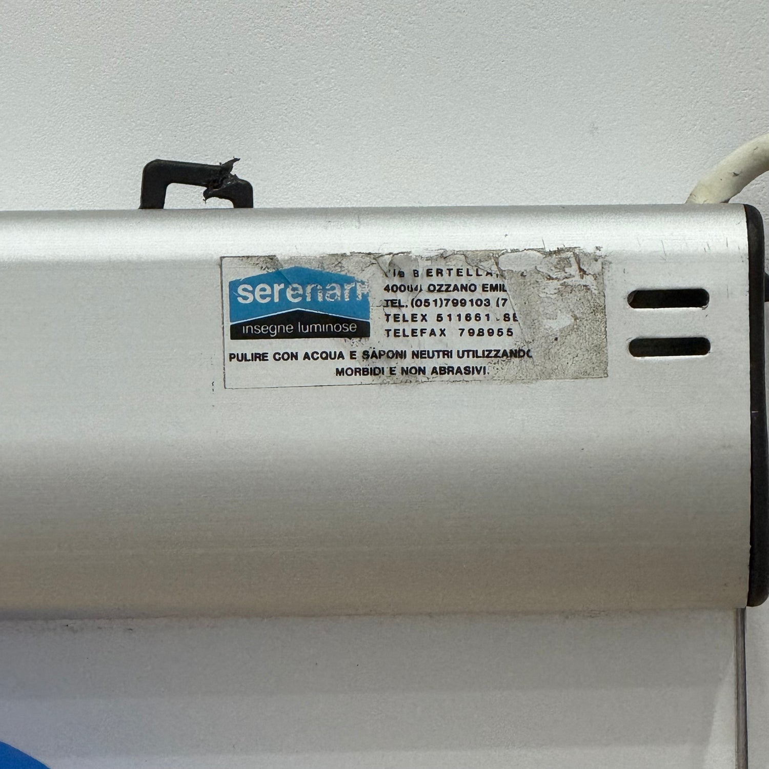 Illuminated Pirelli garage advertising lightbox sign with clock