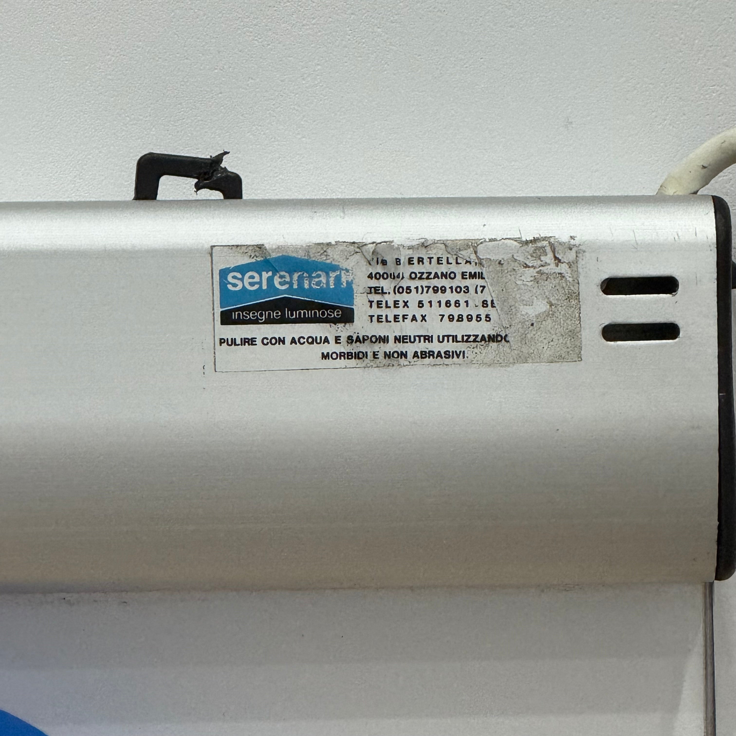 Illuminated Pirelli garage advertising lightbox sign with clock