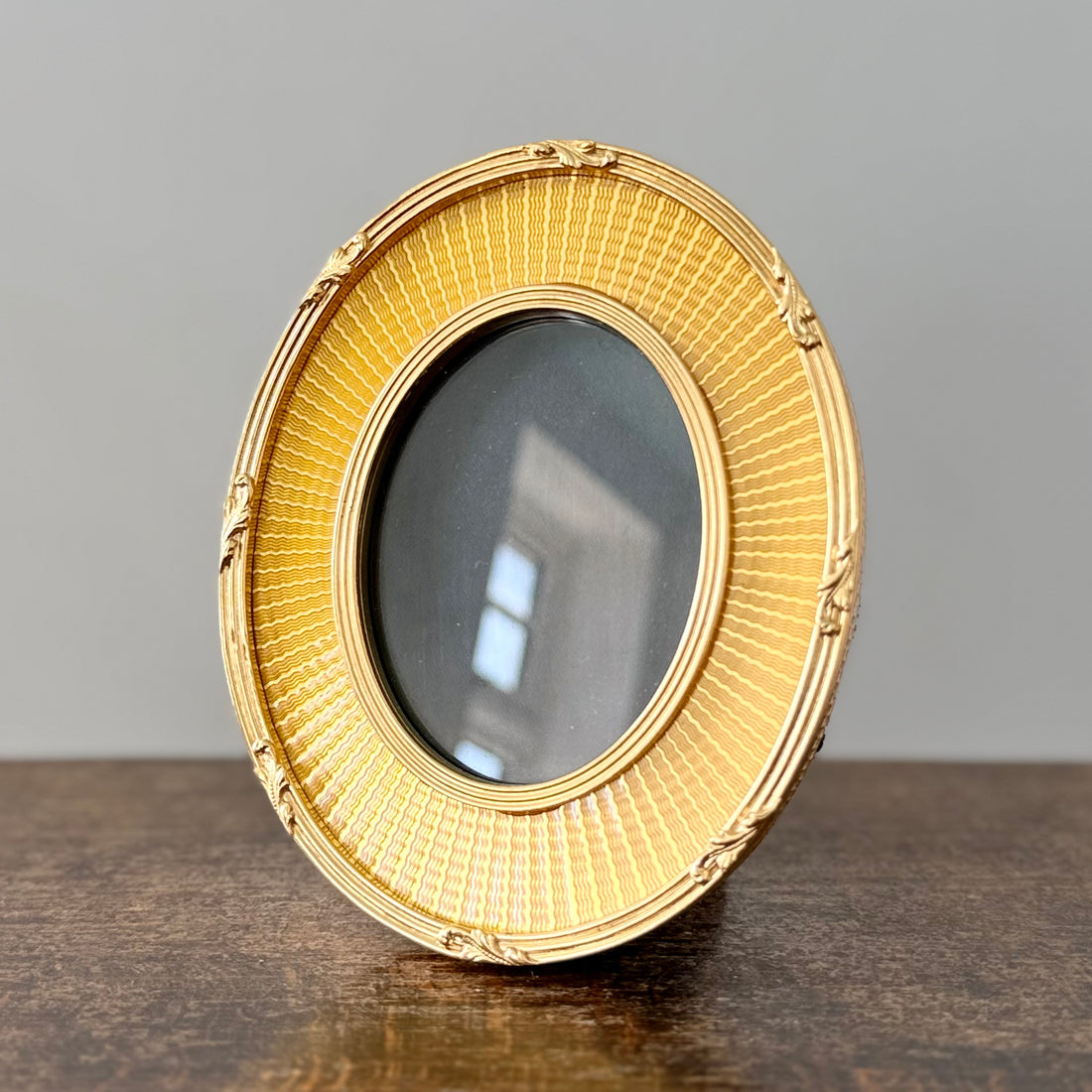 Gold oval frame