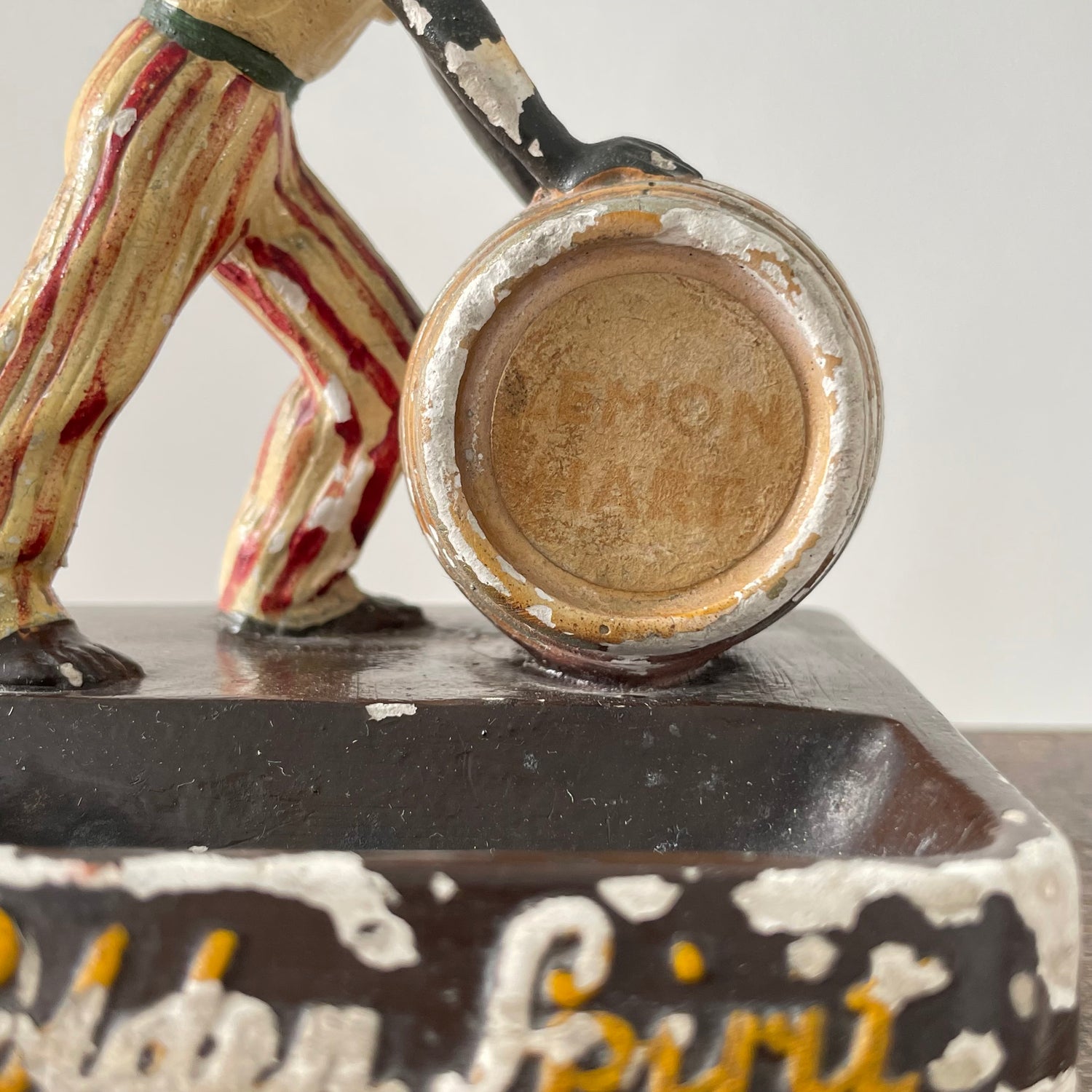 Antique “The Golden Spirit” Lemon Hart Rum Advertising Ceramic Figure Ashtray c.1920s–30s (Repaired)
