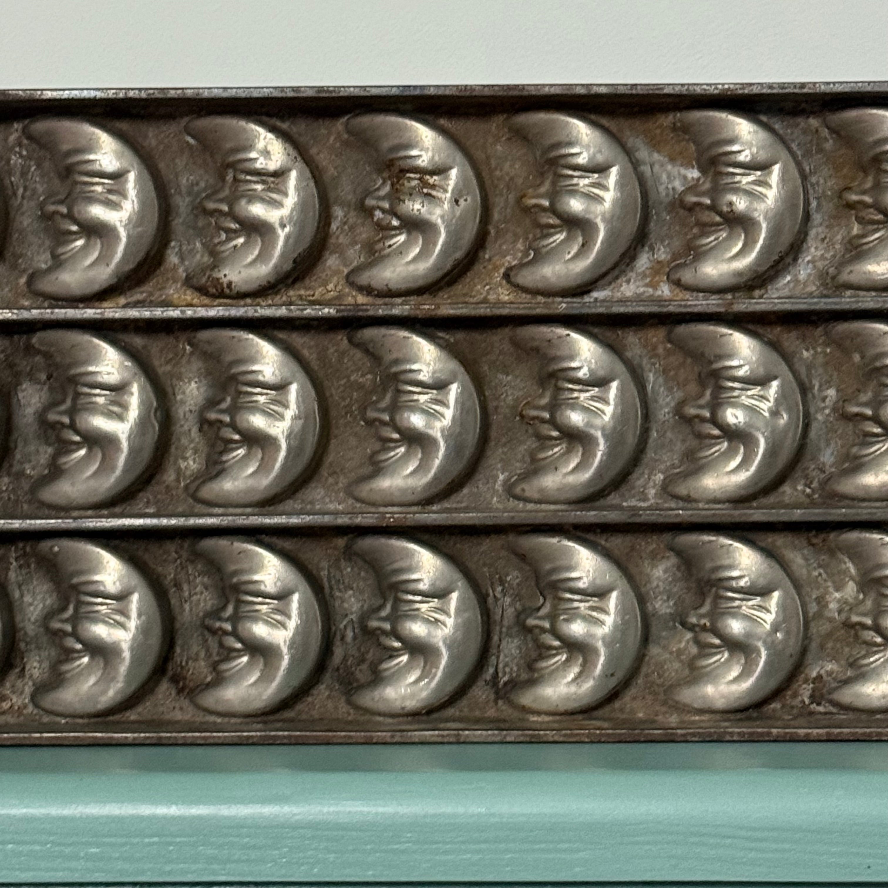 Anton Reiche Antique Chocolate Mould – Crescent Moon Faces