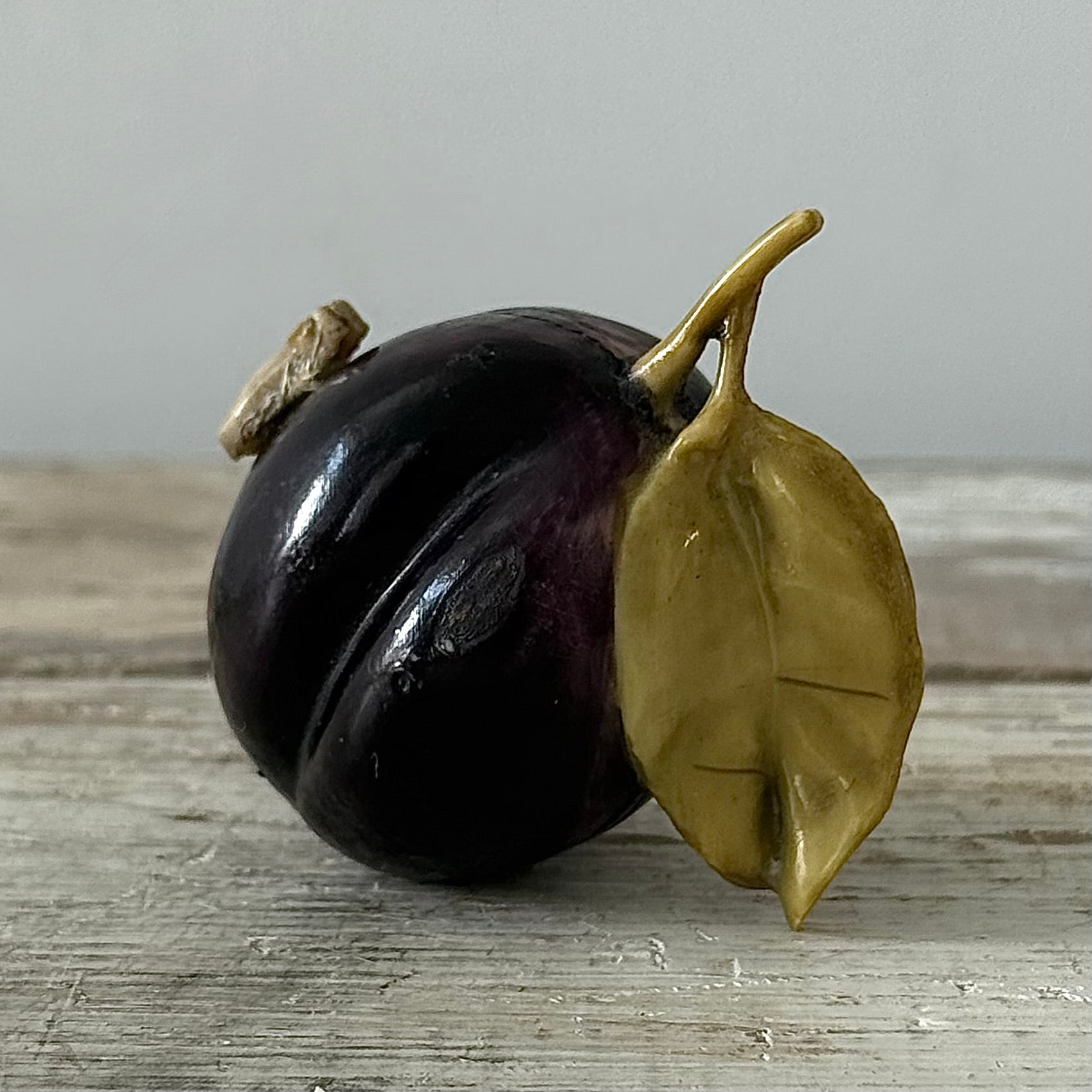 Antique Celluloid Plum Tape Measure with Fly Pull