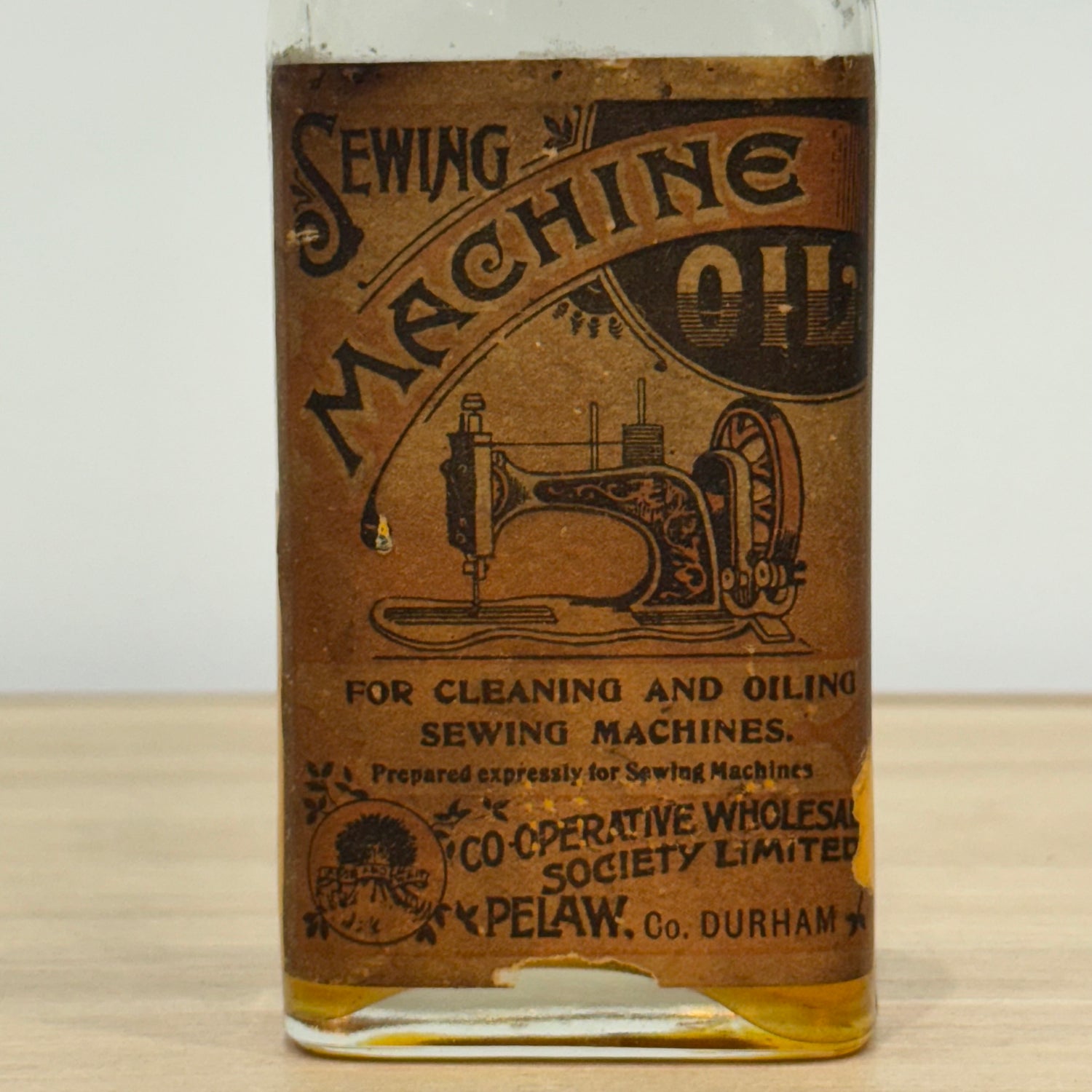 Edwardian Sewing Machine Oil Bottle, Cooperative Wholesale Society, Pelaw