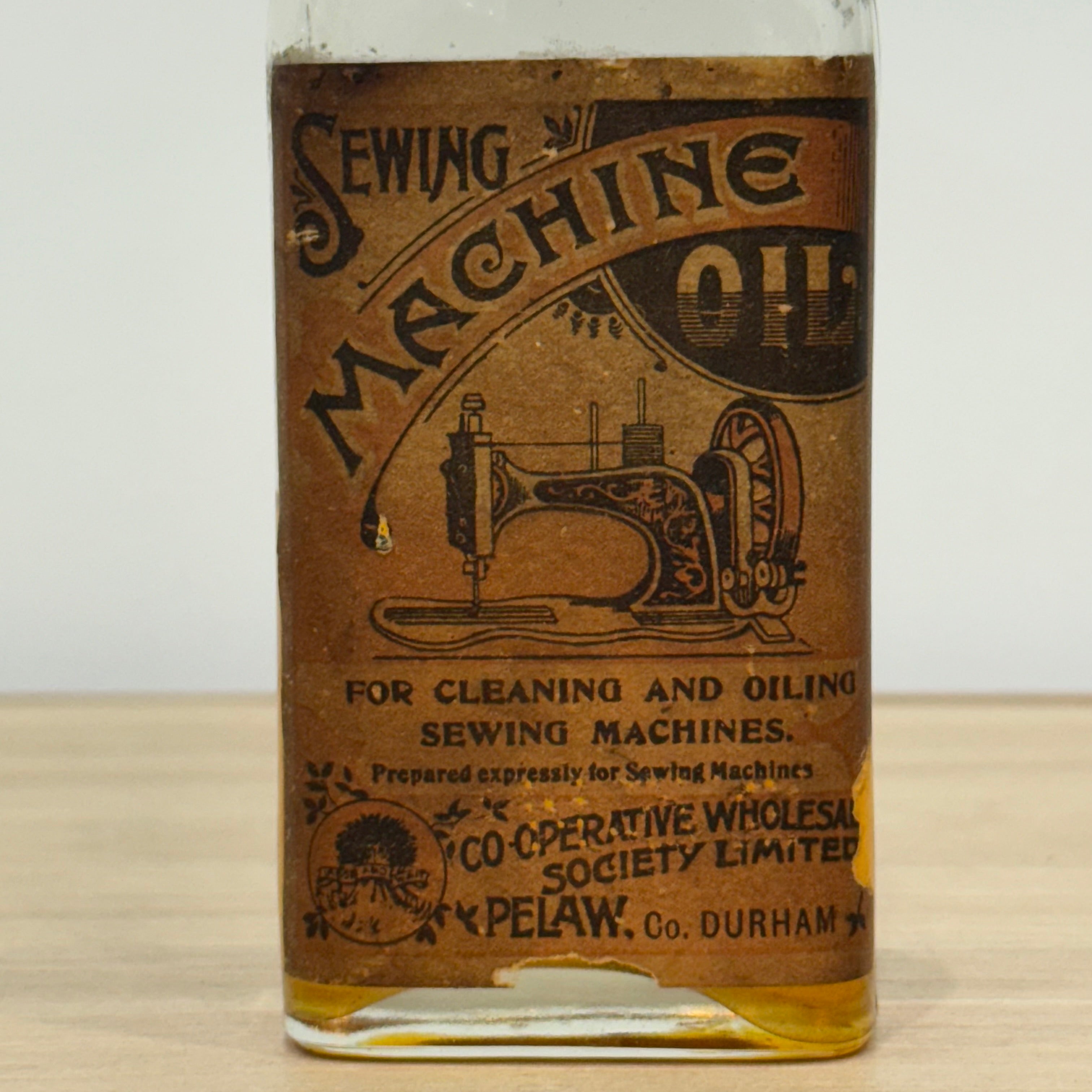 Edwardian Sewing Machine Oil Bottle, Cooperative Wholesale Society, Pelaw