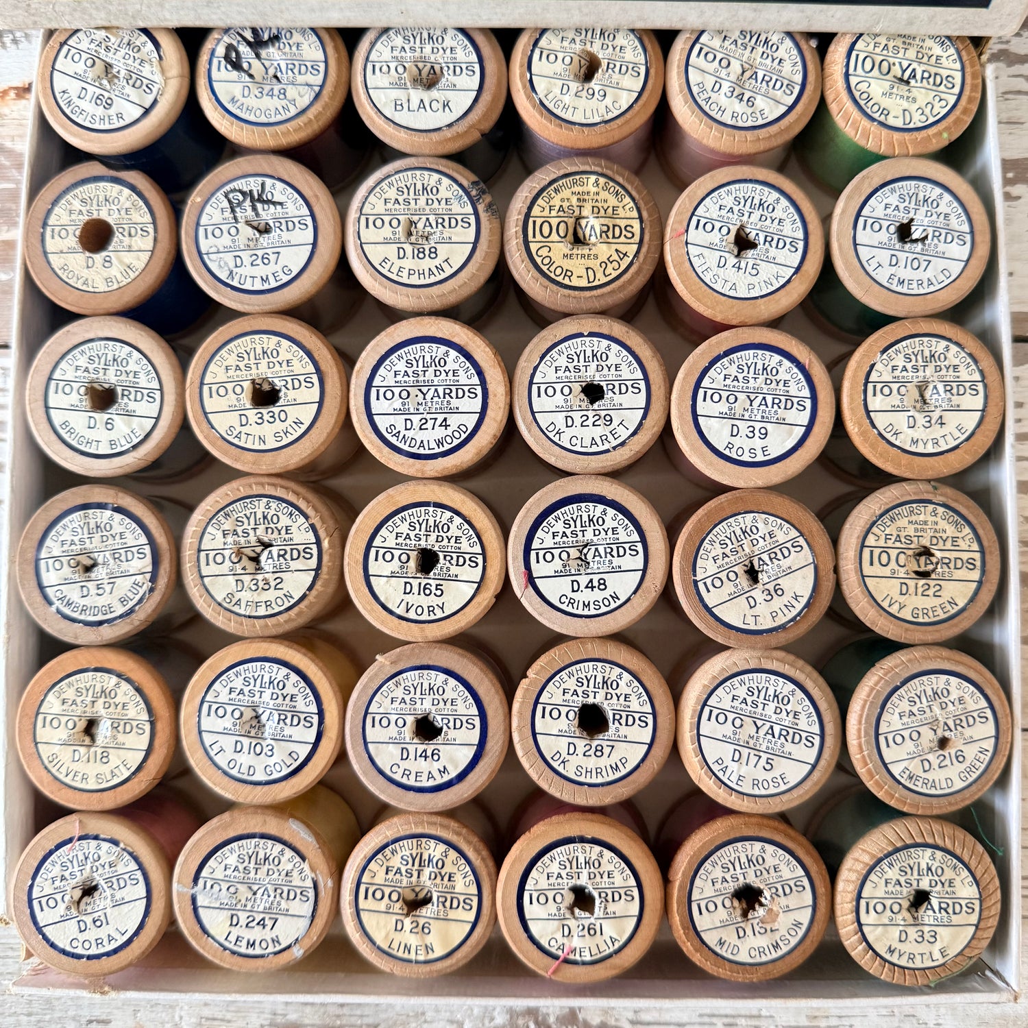 Vintage Dewhurst’s Sylko 36 Wooden Cotton Reels in Advertising Box