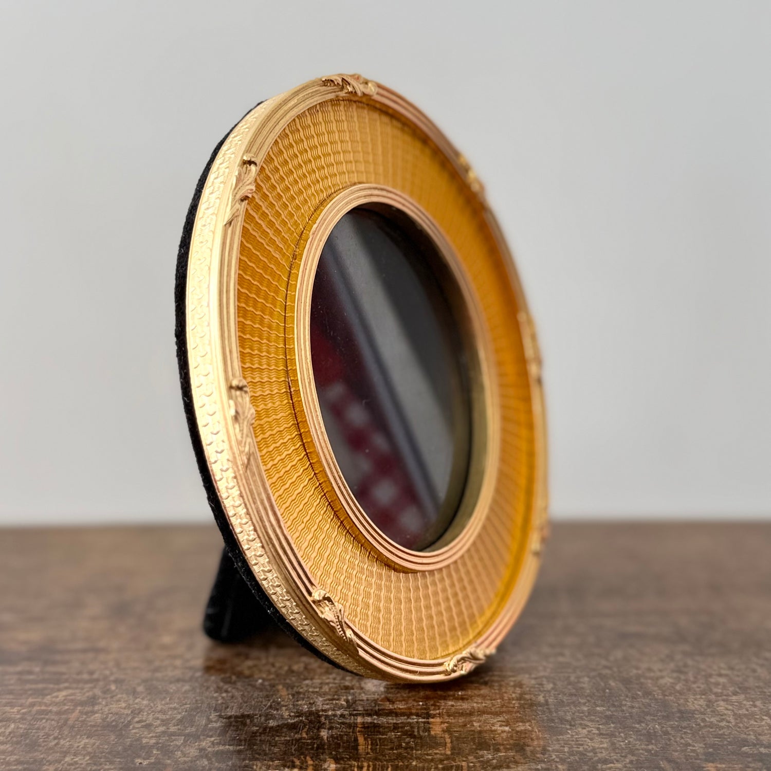 Gold oval frame