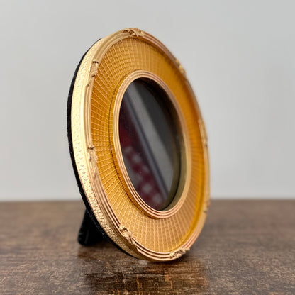 Gold oval frame