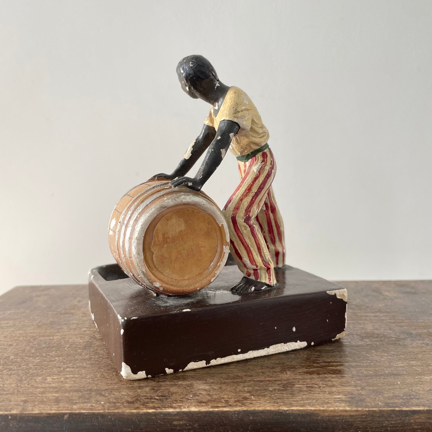 Antique “The Golden Spirit” Lemon Hart Rum Advertising Ceramic Figure Ashtray c.1920s–30s (Repaired)