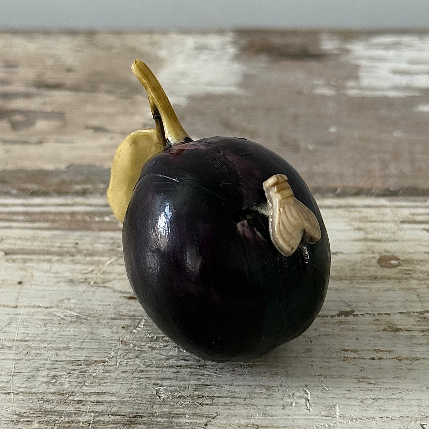 Antique Celluloid Plum Tape Measure with Fly Pull