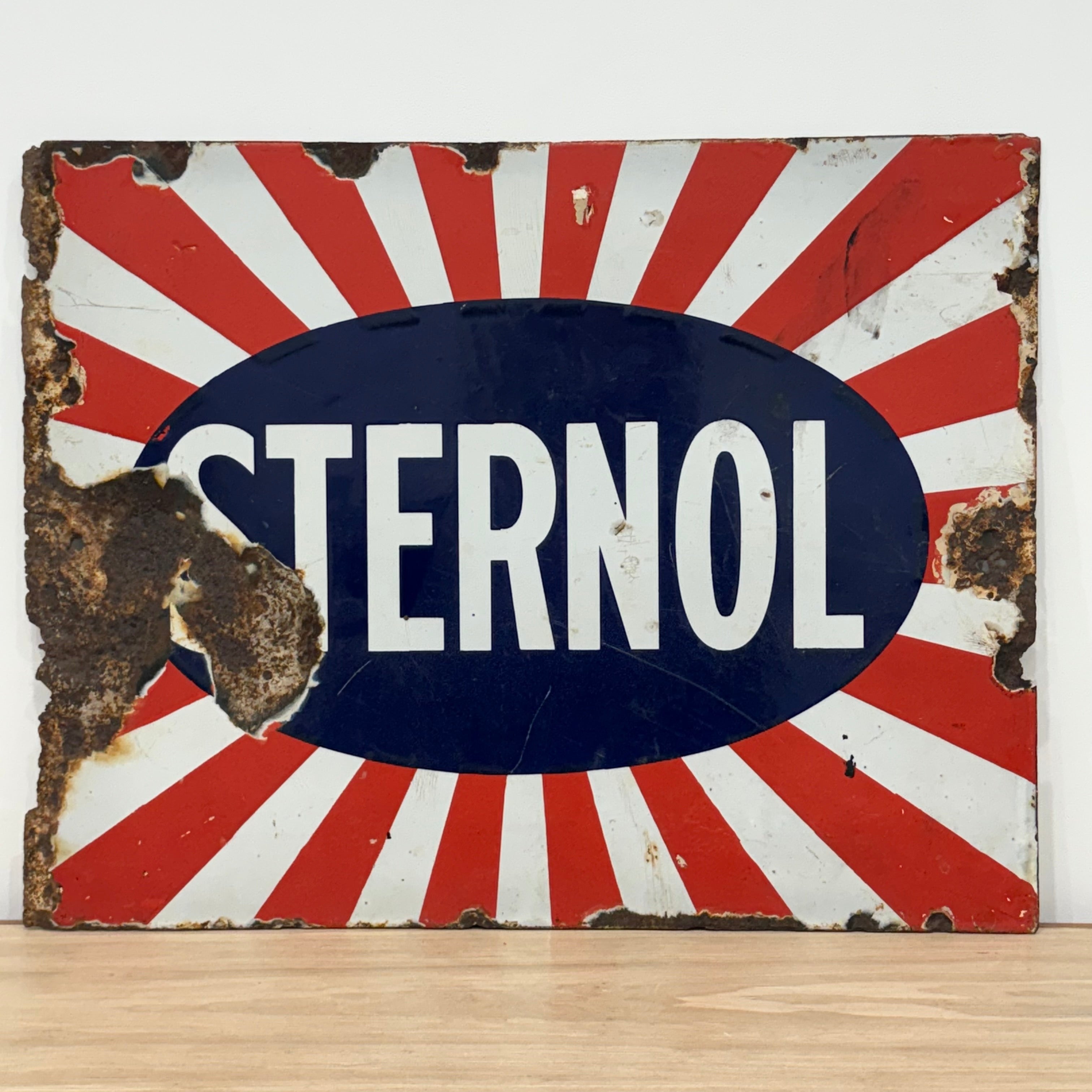 Original Sternol sunburst enamel advertising sign