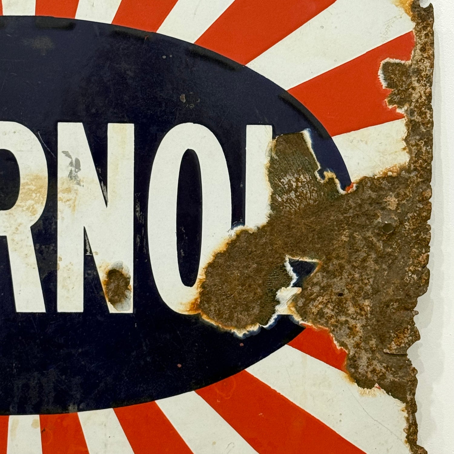 Original Sternol sunburst enamel advertising sign