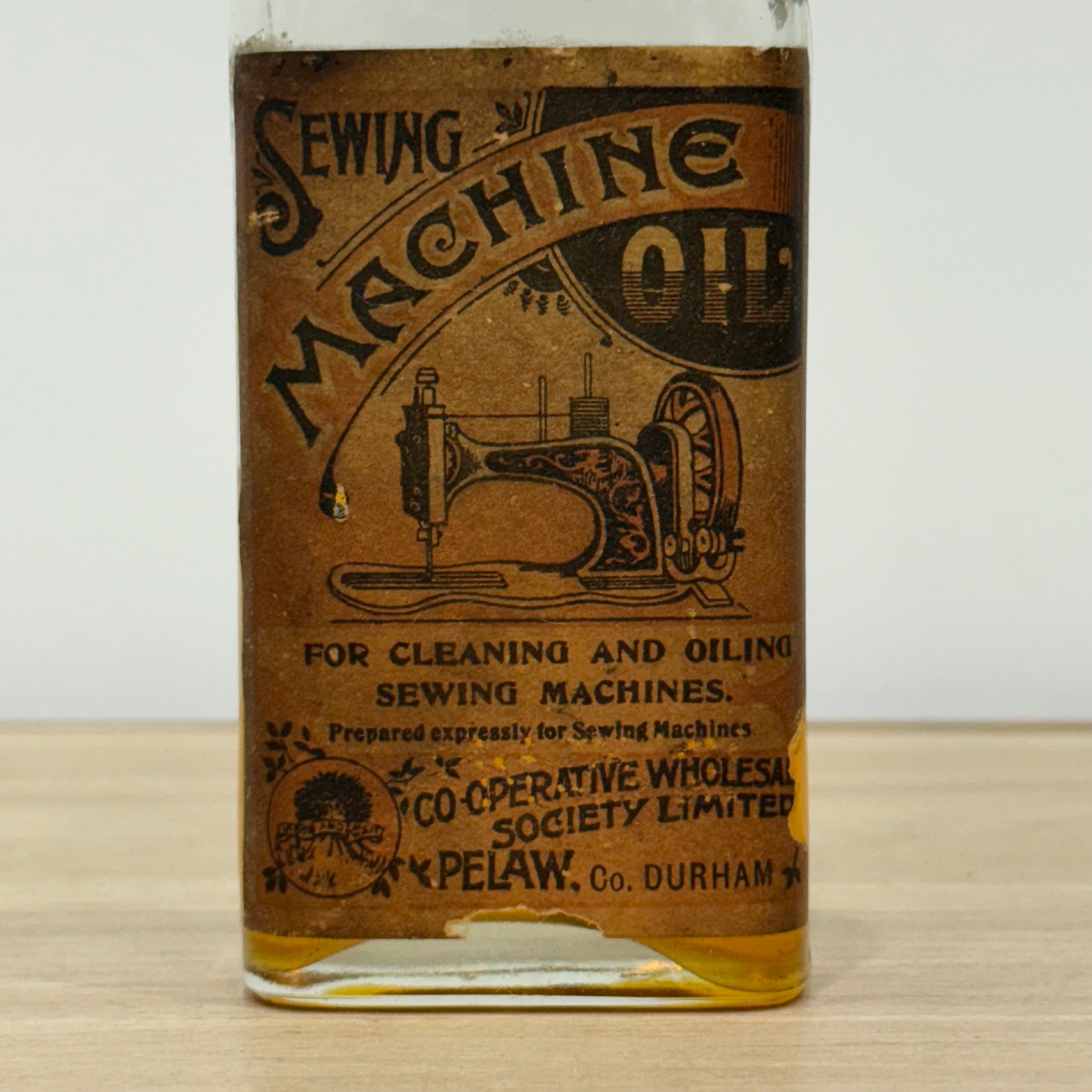Edwardian Sewing Machine Oil Bottle, Cooperative Wholesale Society, Pelaw