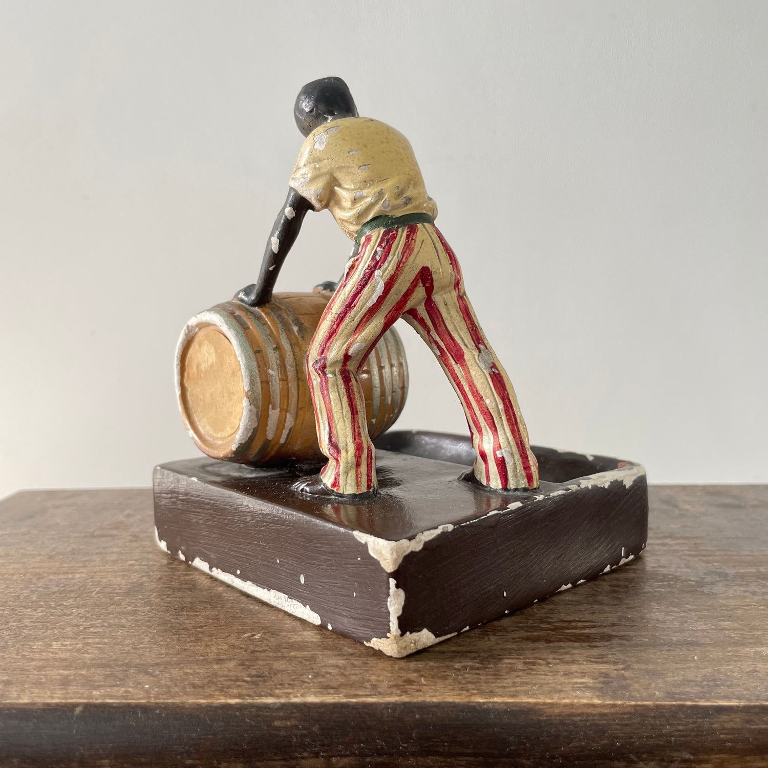 Antique “The Golden Spirit” Lemon Hart Rum Advertising Ceramic Figure Ashtray c.1920s–30s (Repaired)