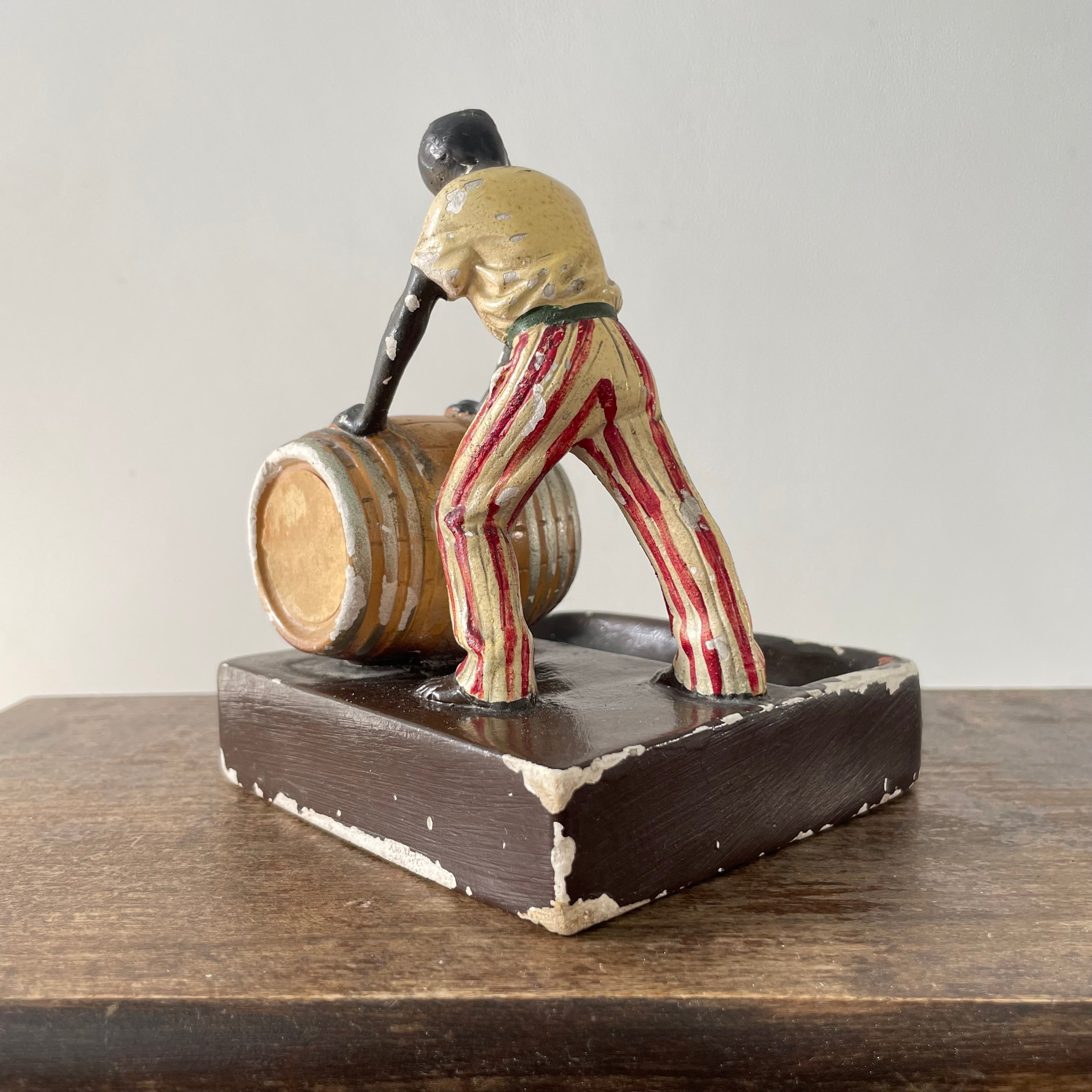 Antique “The Golden Spirit” Lemon Hart Rum Advertising Ceramic Figure Ashtray c.1920s–30s (Repaired)